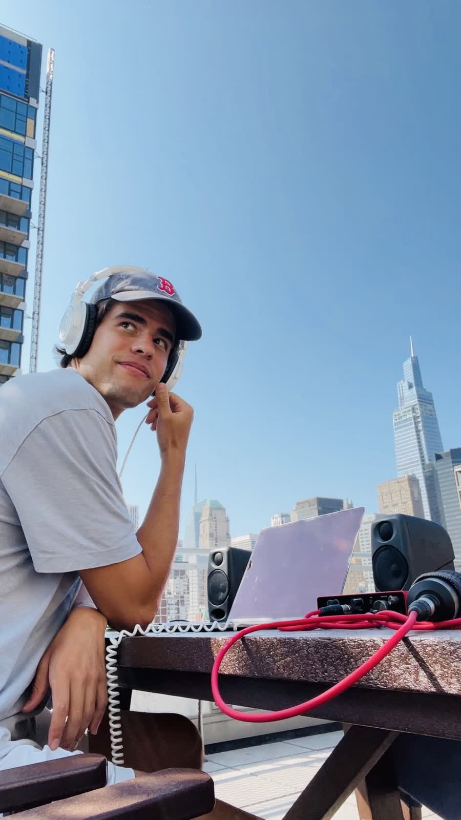 Damian Rodriguez at the decks on a rooftop